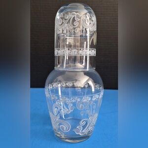 Elegant Clear Glass Carafe with Intricate White Design